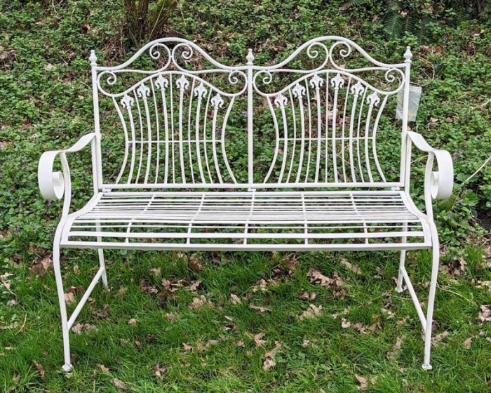 Small white metal garden bench