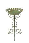 Green metal bird bath