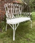 Small white metal garden bench Small white metal garden bench